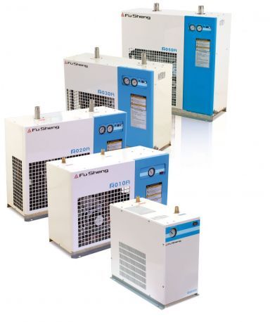 A group of air dryers are sitting next to each other on a white surface.