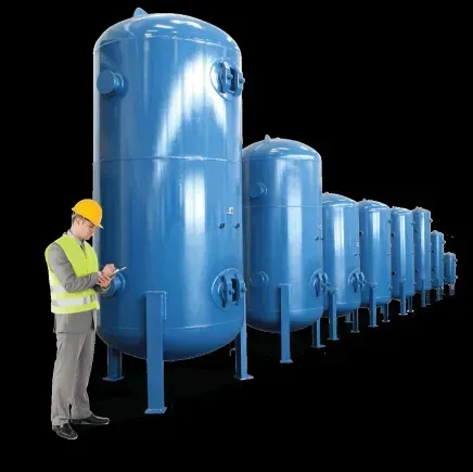 A man is standing next to a row of blue tanks.