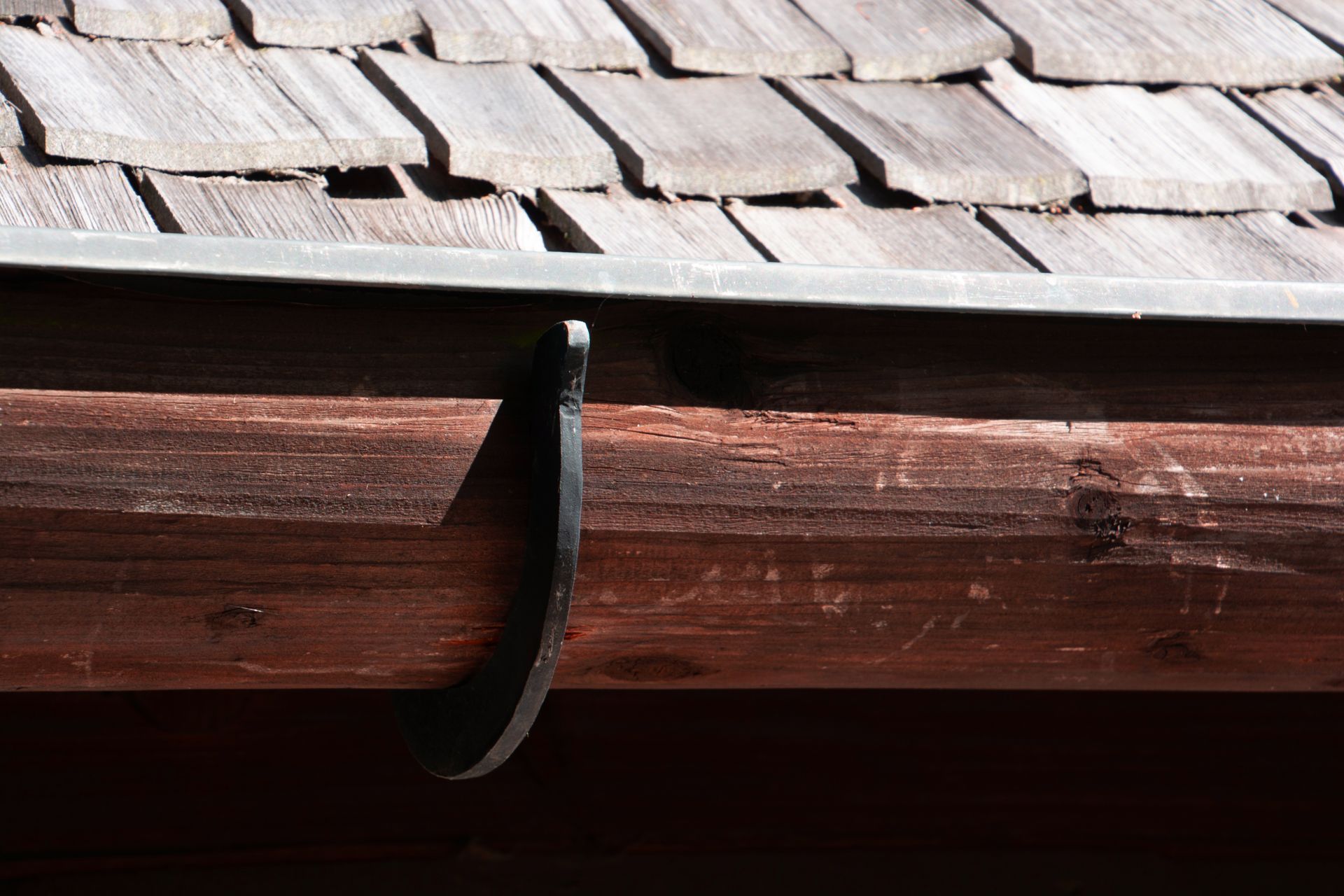 wood gutters vs aluminum gutters