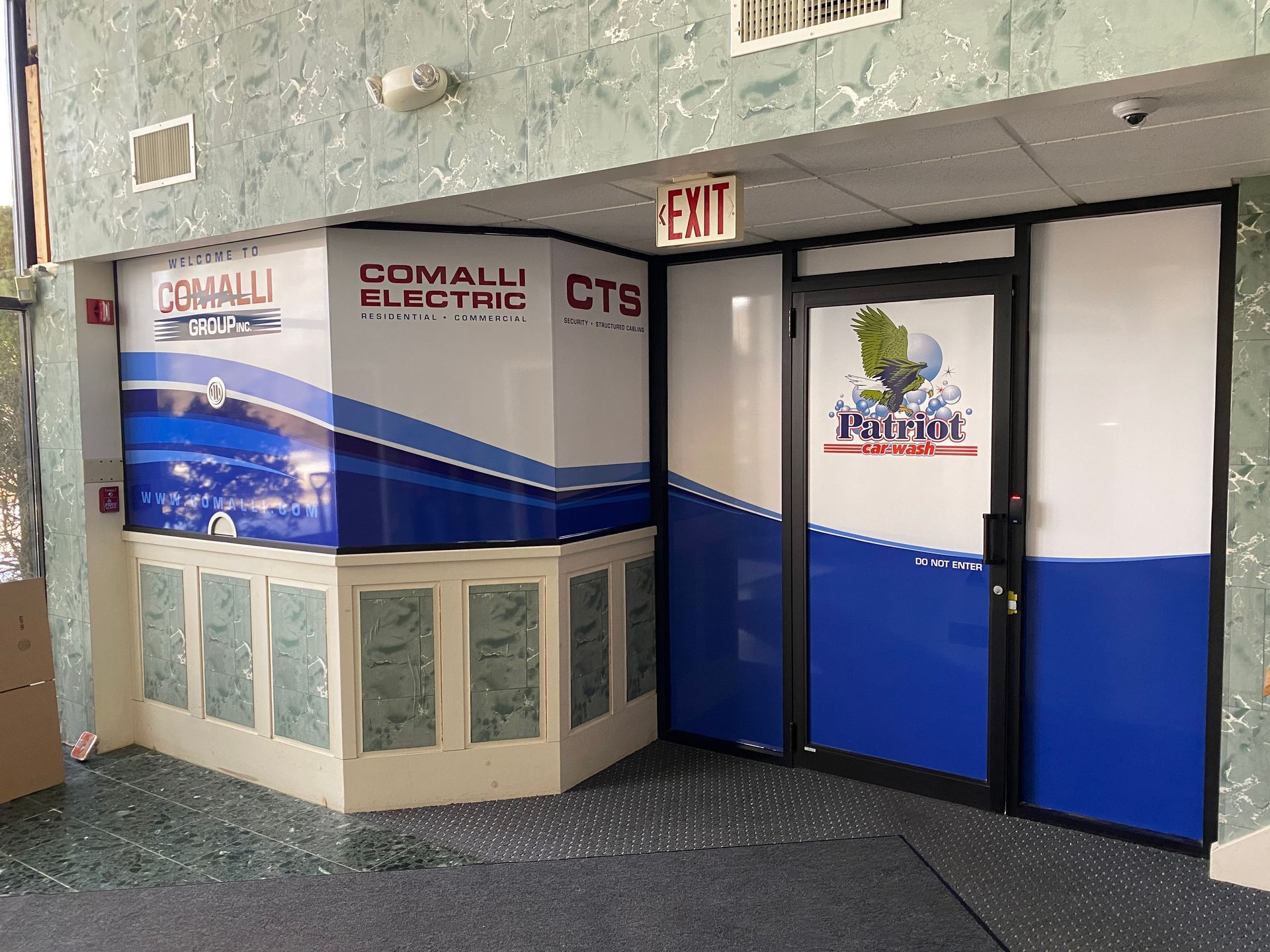 A building with a sign that says ' somali electric ctb ' on it