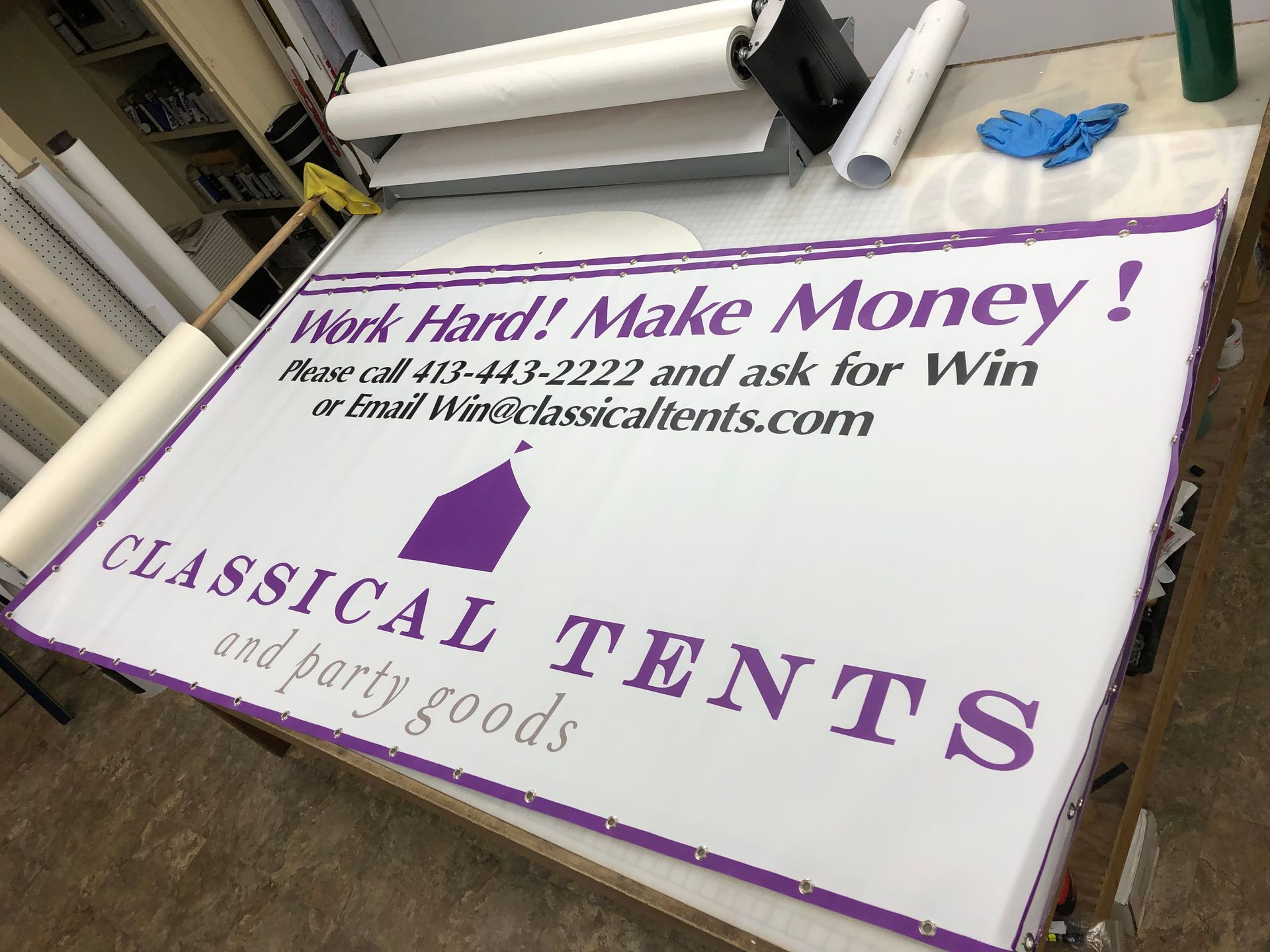 A sign that says work hard make money classical tents and party goods