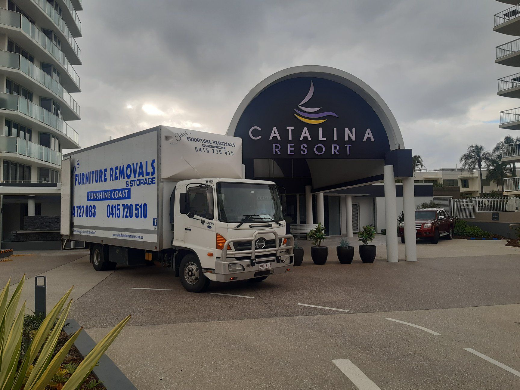 Removal Truck Parked At Front Of Catalina Resort— John's Furniture Removals in Yandina, QLD