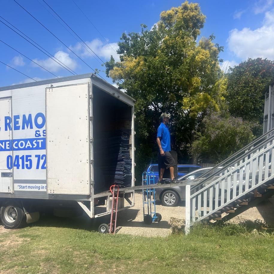 Moving Truck Being Loaded by a Man on a Ramp — John's Furniture Removals in Sunshine Coast, QLD