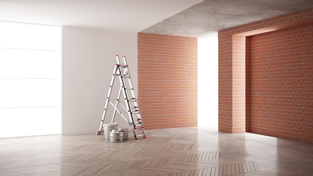 A Room with Brick and White Walls — Commercial Asset Maintenance In Logan, QLD