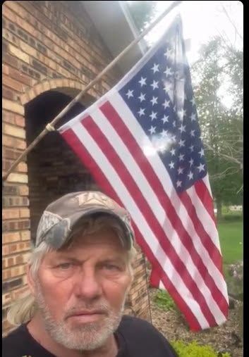 Dale Briggs, veteran and founder of DWB Innovative Ventures, with an American flag