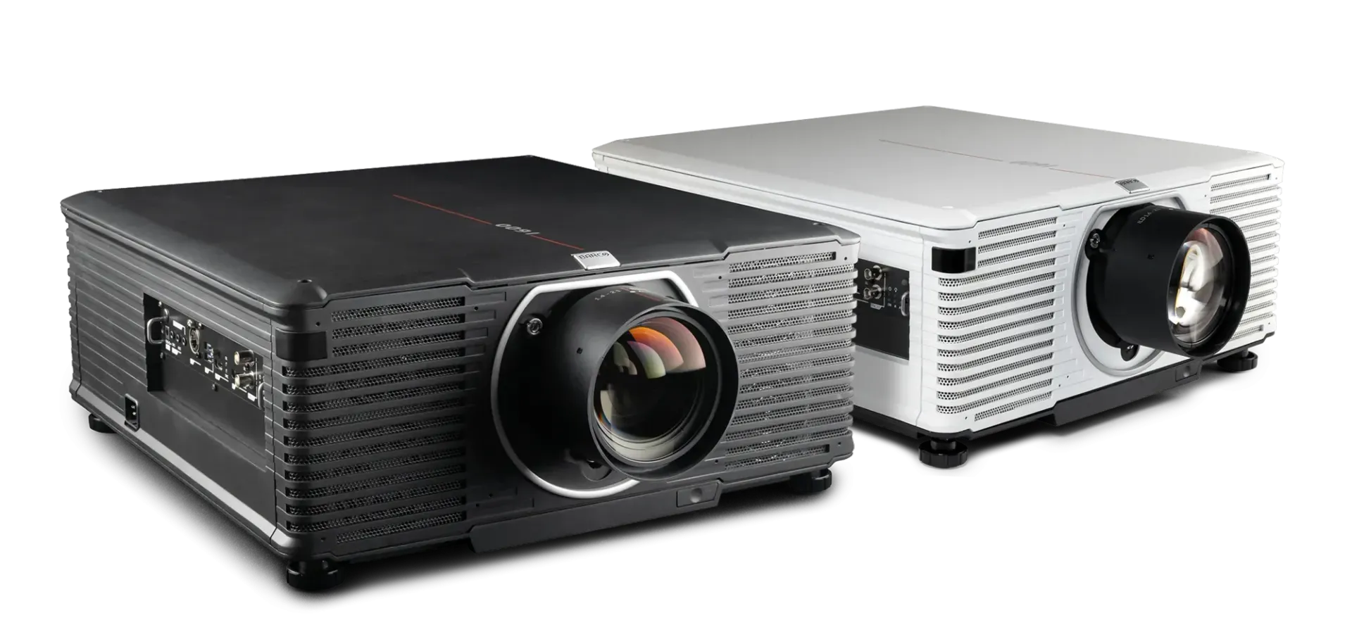 Two projectors, one black, one white, side-by-side, angled on a white surface.