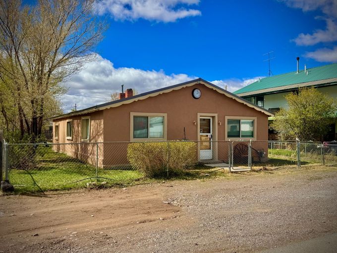 Stucco Casa vacation rental home in Antonito Colorado with fenced yard