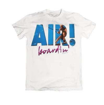 White T-shirt with blue “AIX!” text and pink “hardin” script, featuring a small character graphic