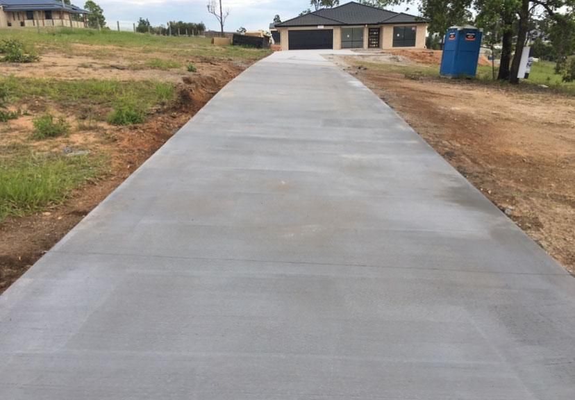 Concrete Driveway Leading to a House — Construction 33 in Maroochydore, QLD