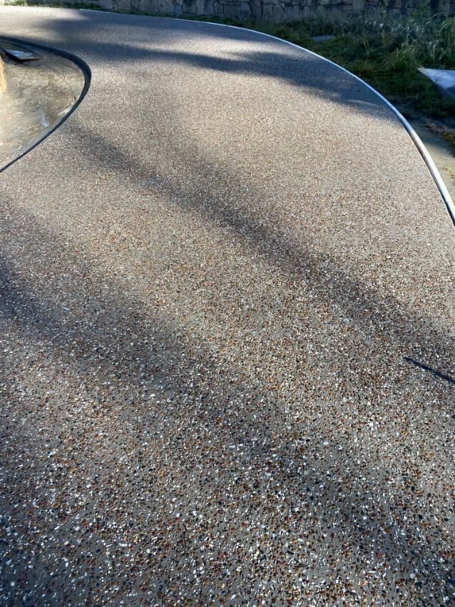 Close Up of a Concrete Driveway With a Curb — Construction 33 in Maroochydore, QLD