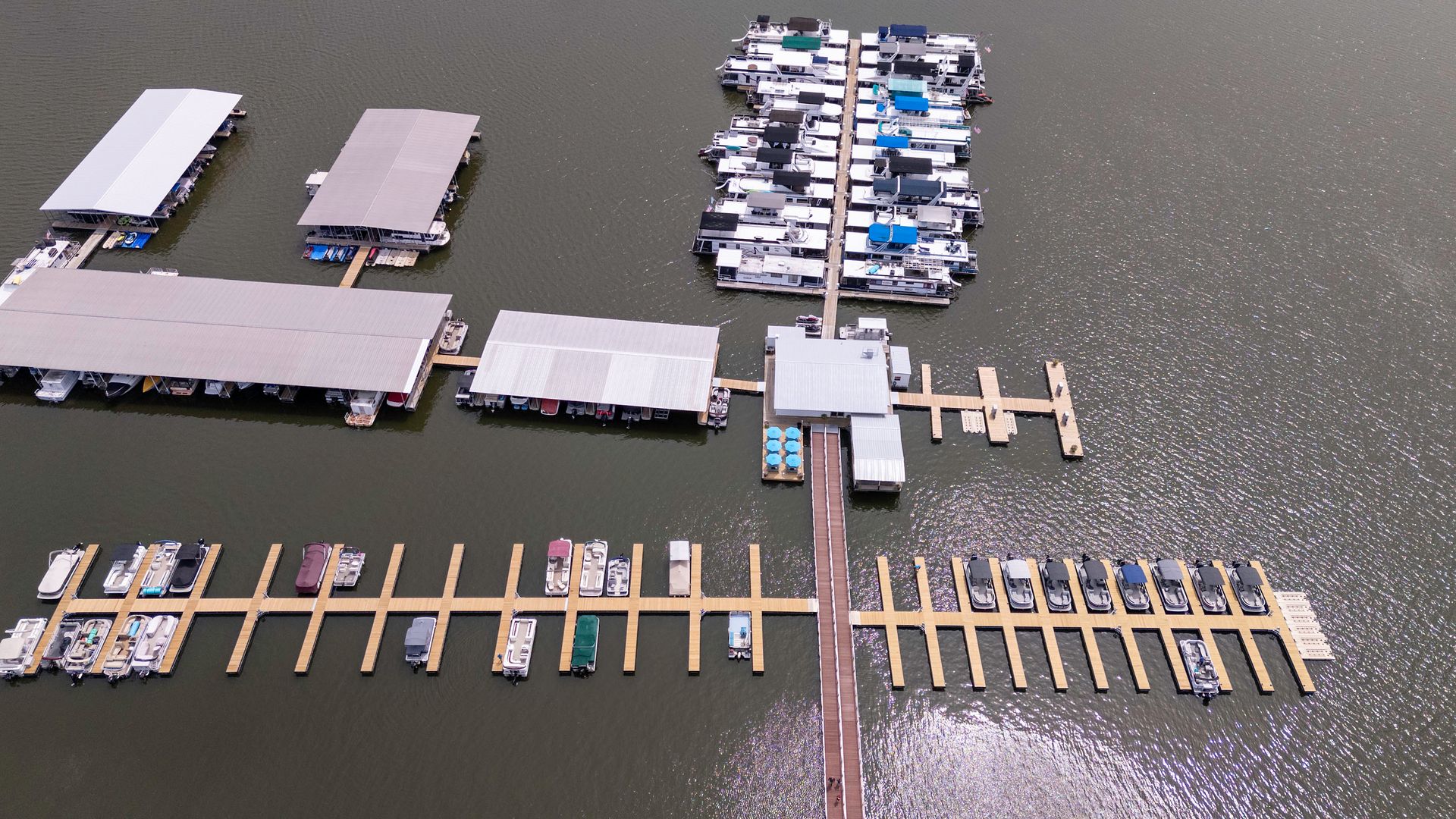 An aerial view of a marina with lots of boats docked