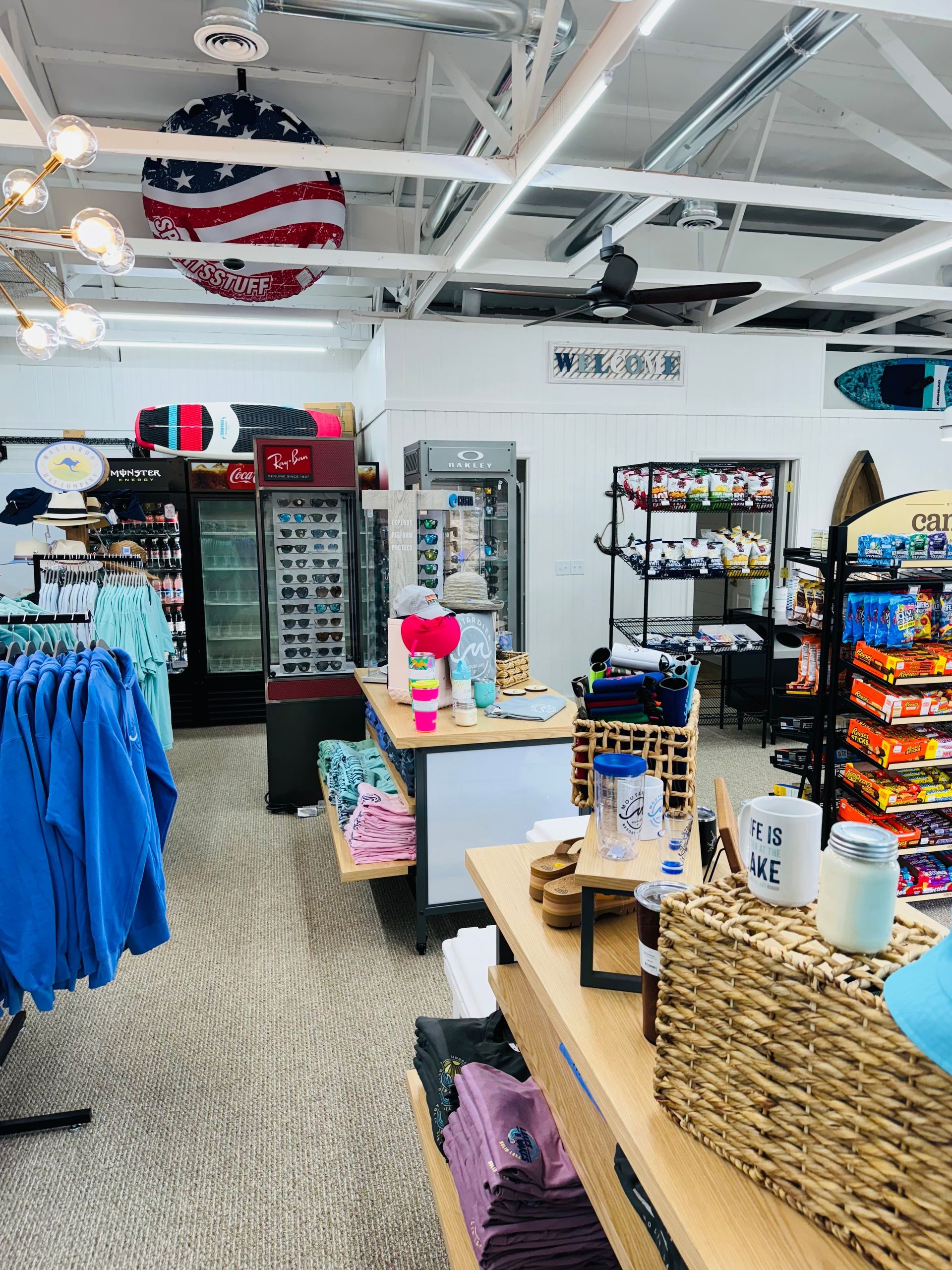 A store filled with lots of clothes and snacks.