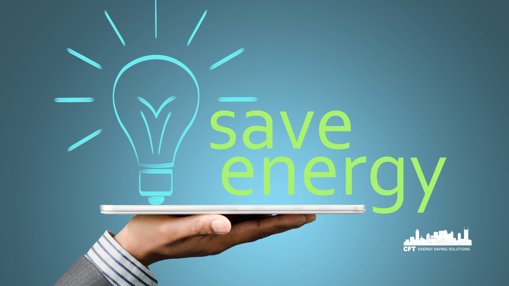 A person is holding a tablet with a light bulb and the words save energy written on it