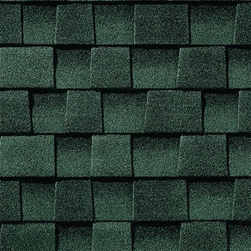 Dark green asphalt roof shingles in a repeating pattern.