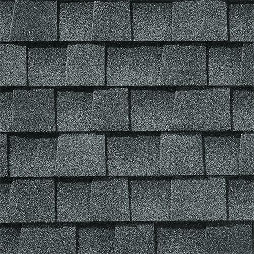 Dark gray asphalt roofing shingles.