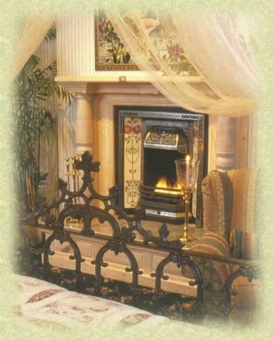 A bedroom with a fireplace and a bed