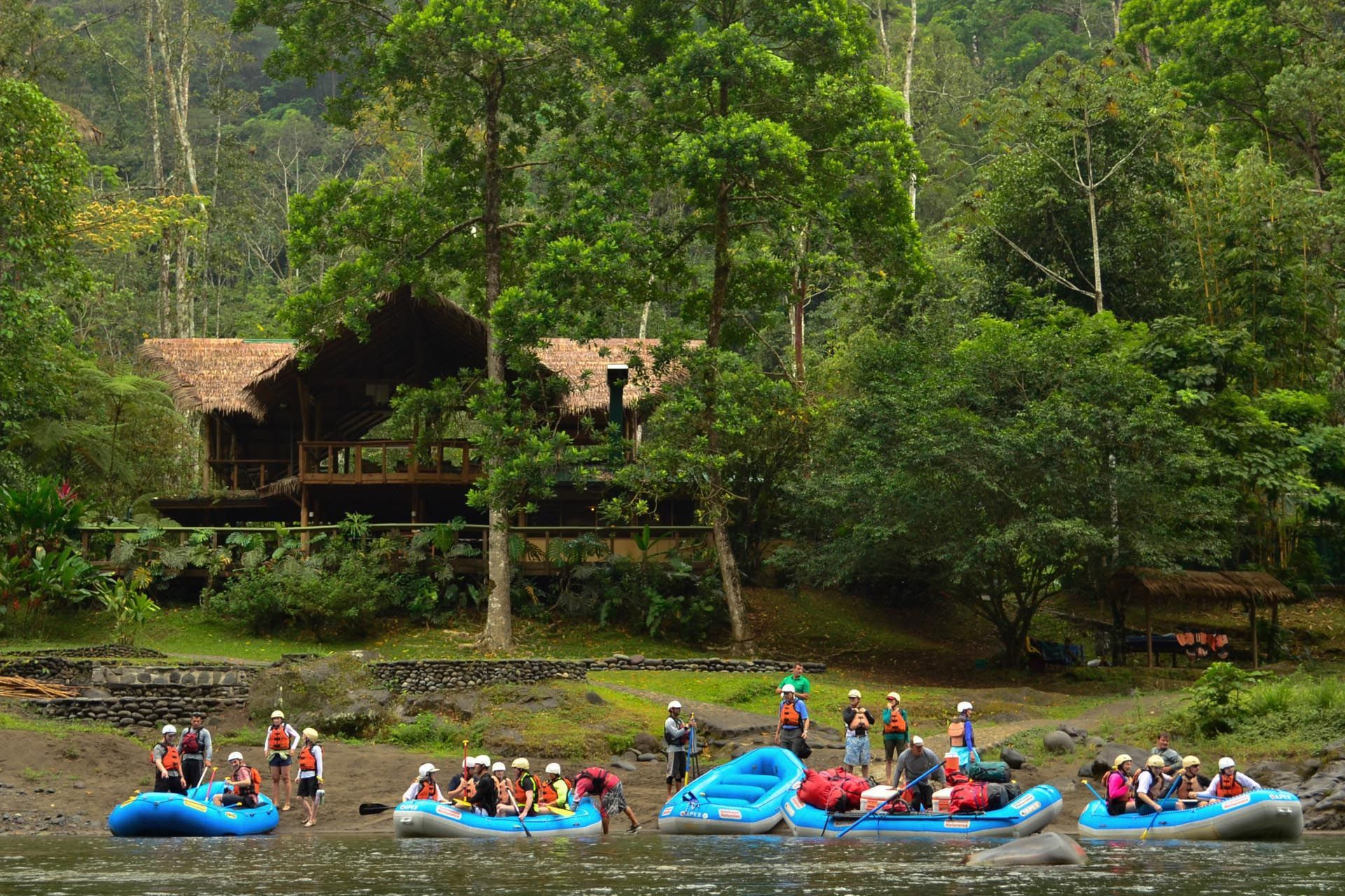 Rafts float beside a riverside lodge in Costa Rica