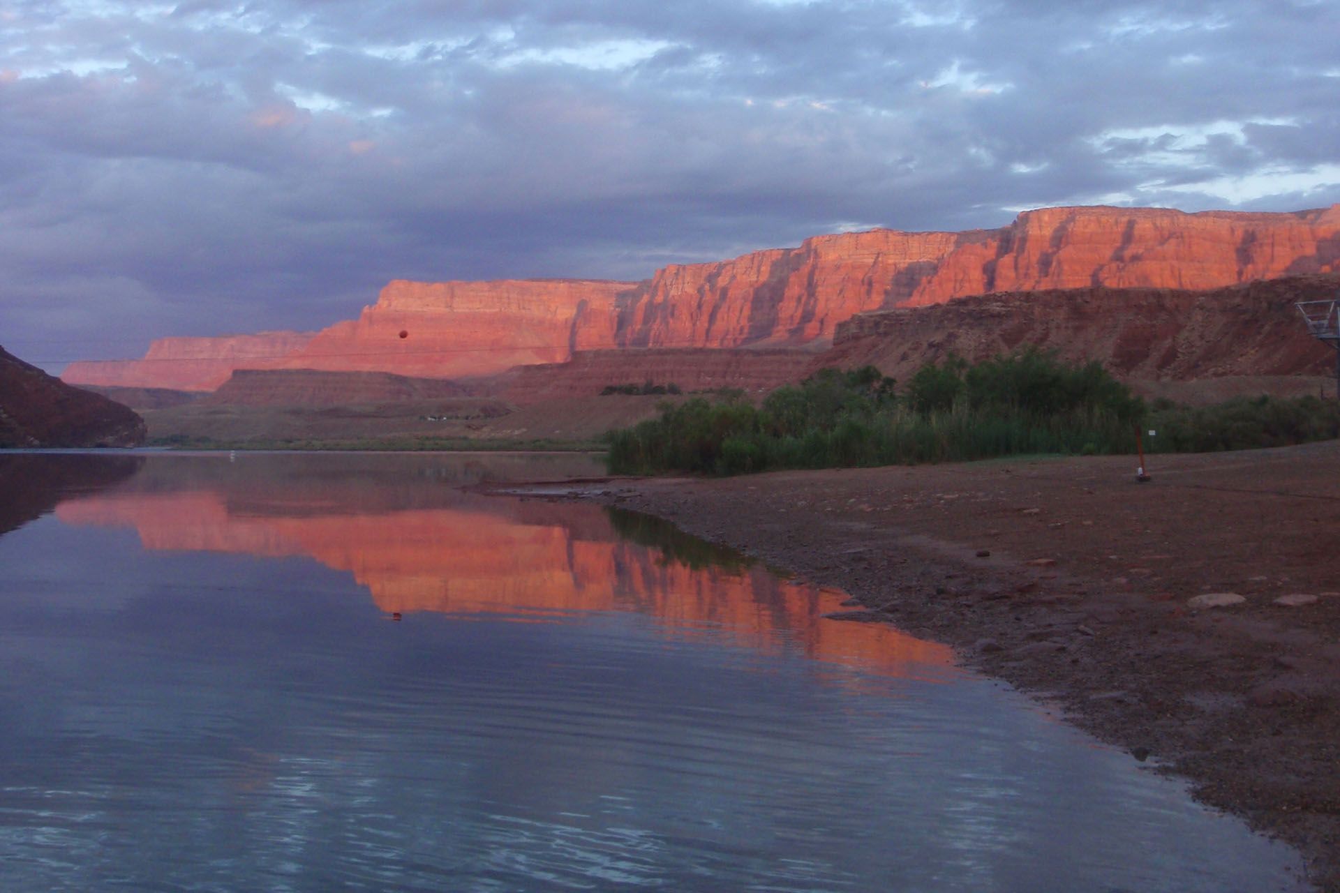 Dusk reflected on calm Colorado River water near Lees Ferry