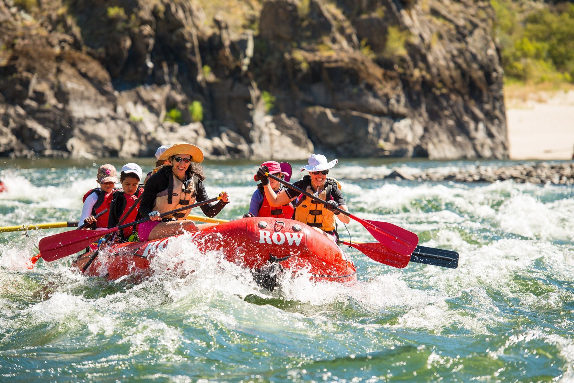 Paddle crew rafting through whitewater on the Lower Salmon River