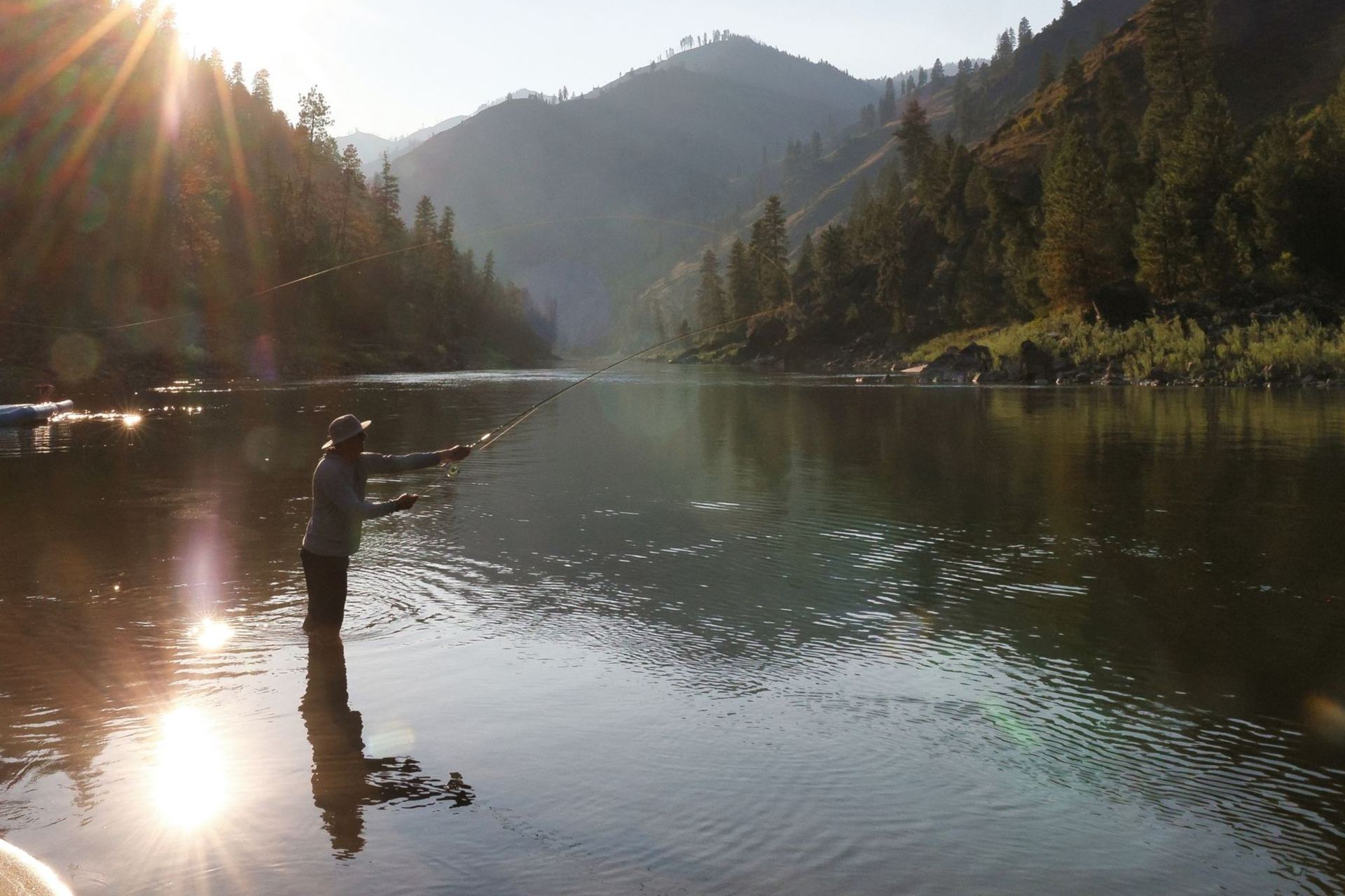 Sunlight reflected on a calm stretch of the Salmon River