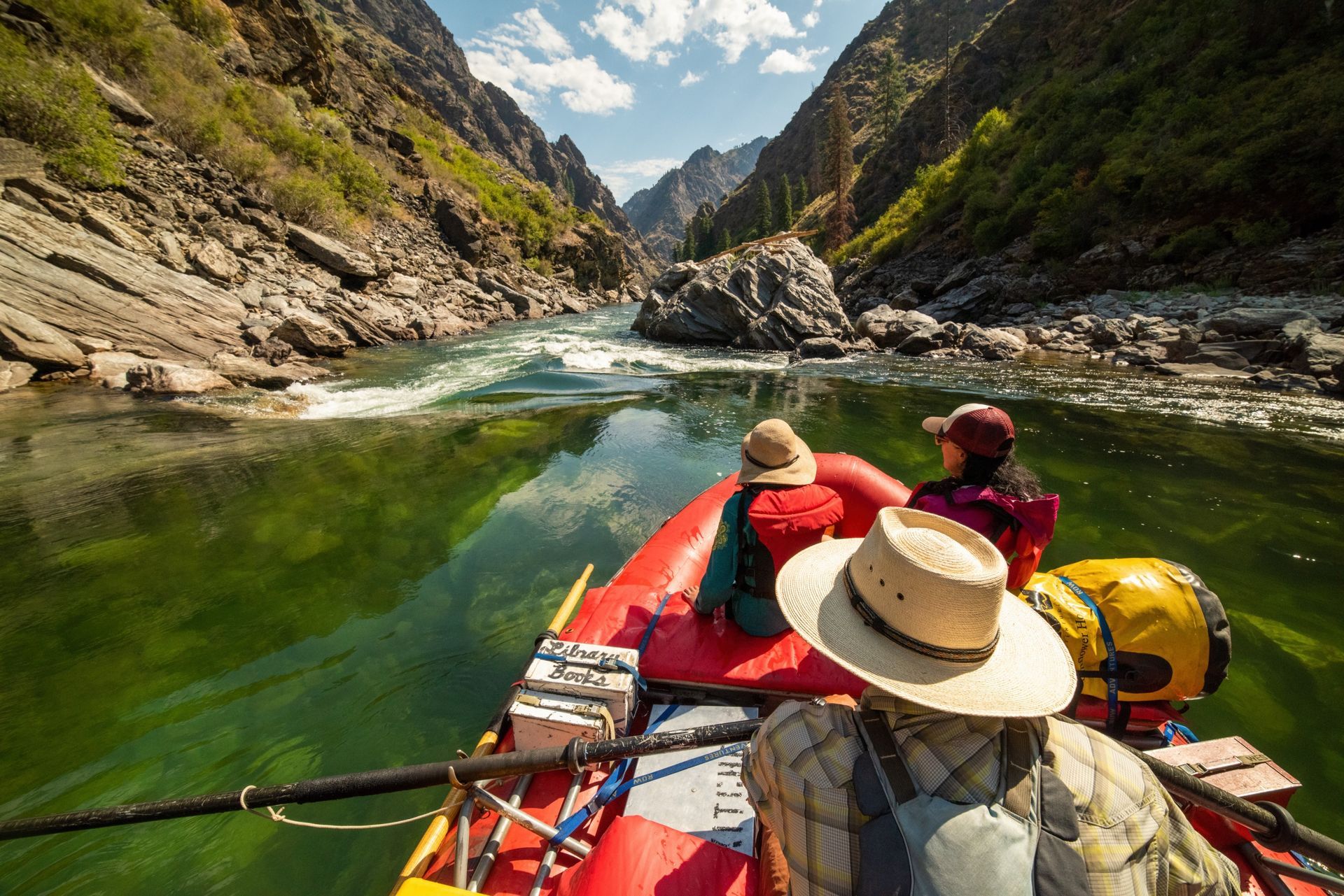 View from an oar raft floating through a rocky Middle Fork Salmon River canyon