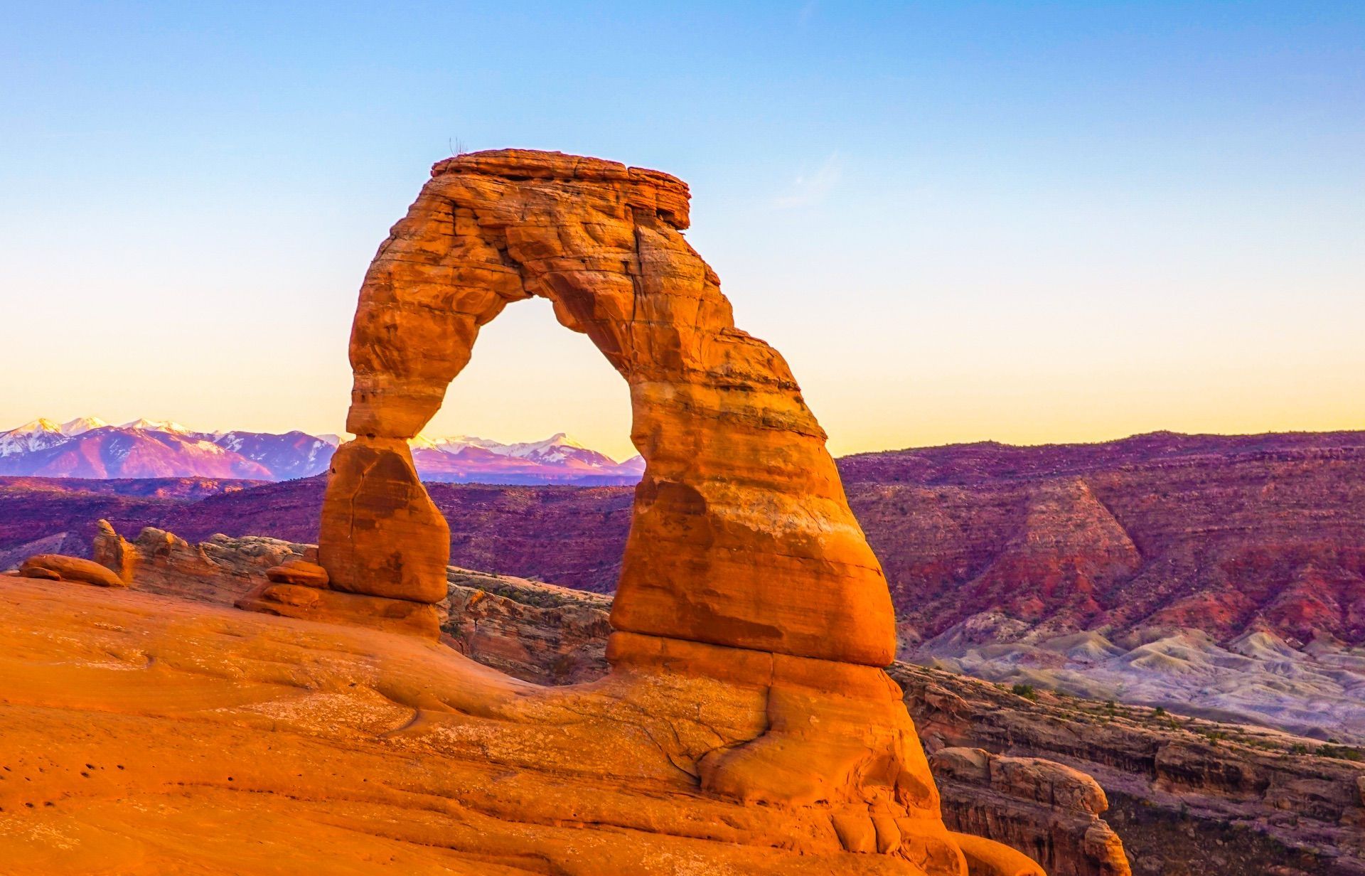 Delicate Arch illuminated at sunset in Arches National Park