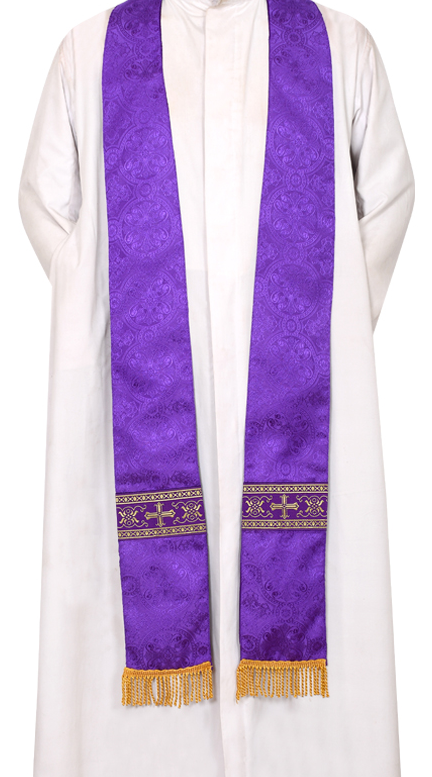 A man wearing a white robe and a purple stole