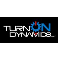 Logo for Turn On Dynamics. Text is white, blue, and red with a gear icon and a black background.