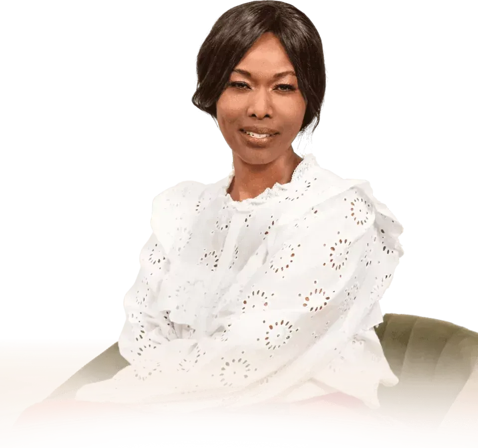 Portrait of Rosebell Murigu, founder and CEO of Capstone Medical Billing Holdings in a white blouse