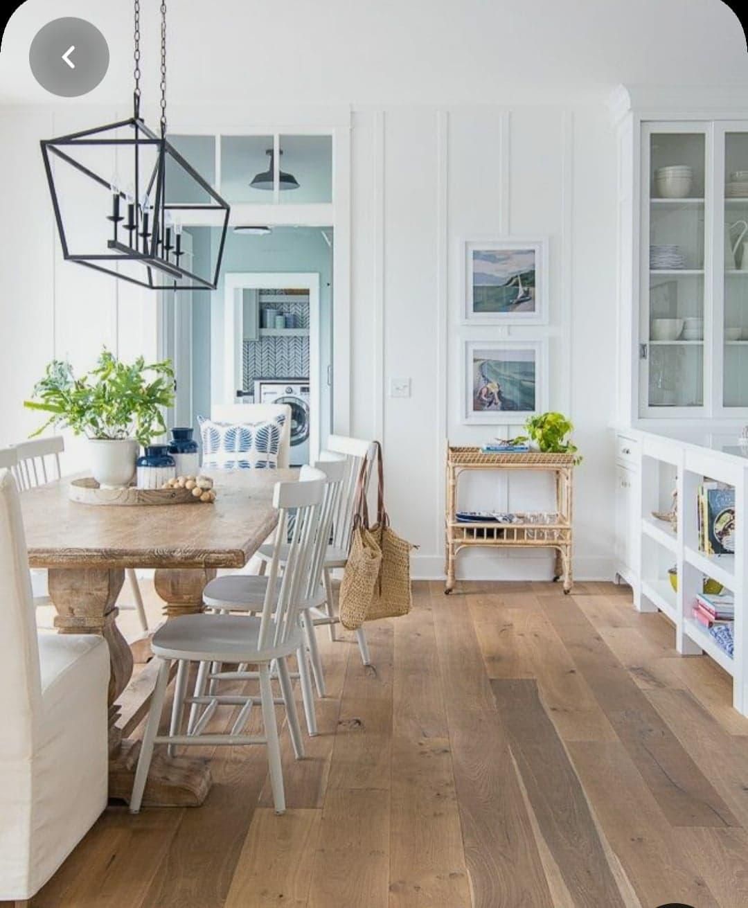 A Dining Room With a Wooden Table and Chairs — Kareela Constructions In Tamworth, NSW