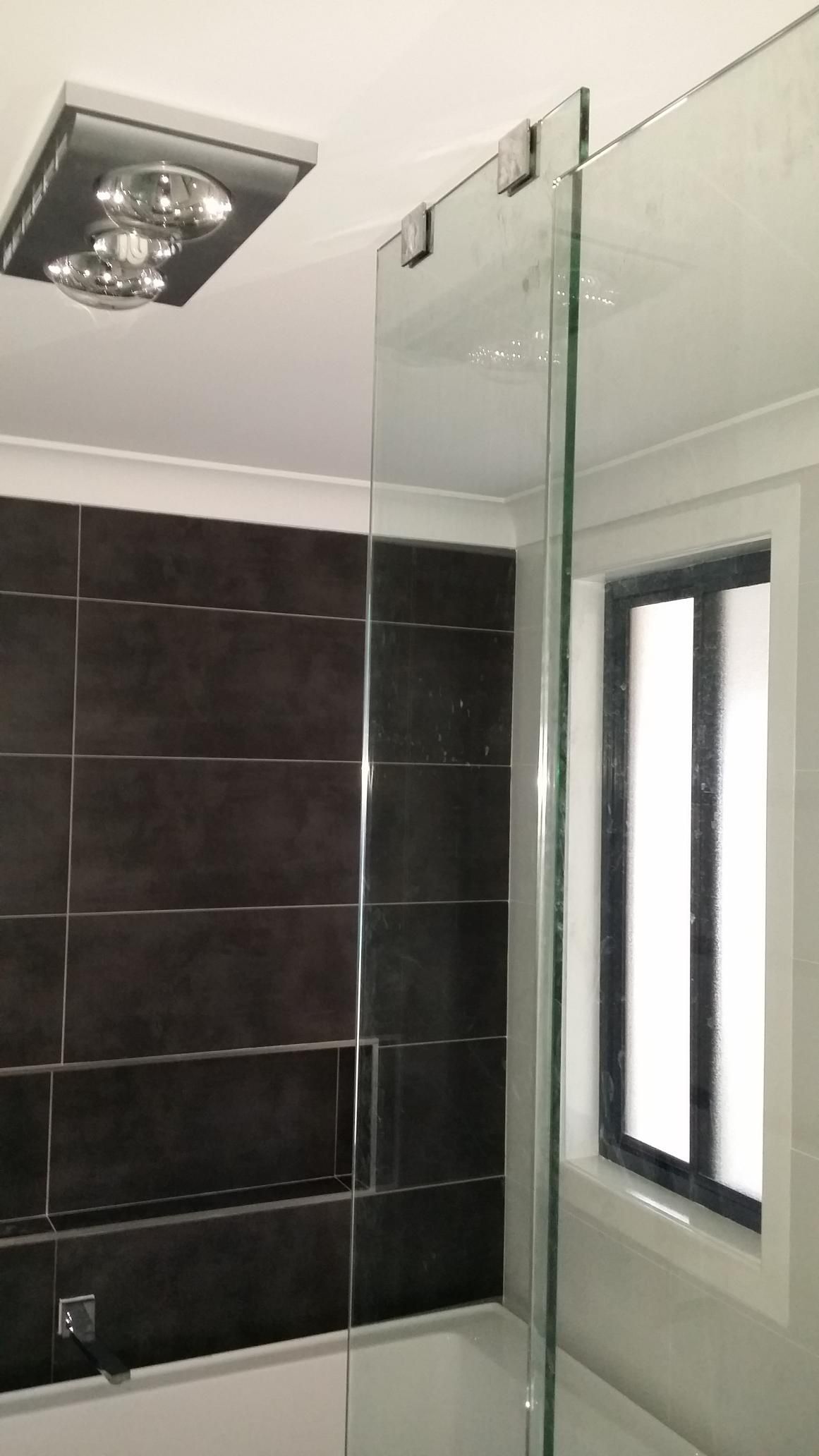 A Bathroom With a Shower Stall and a Window — Kareela Constructions In Tamworth, NSW