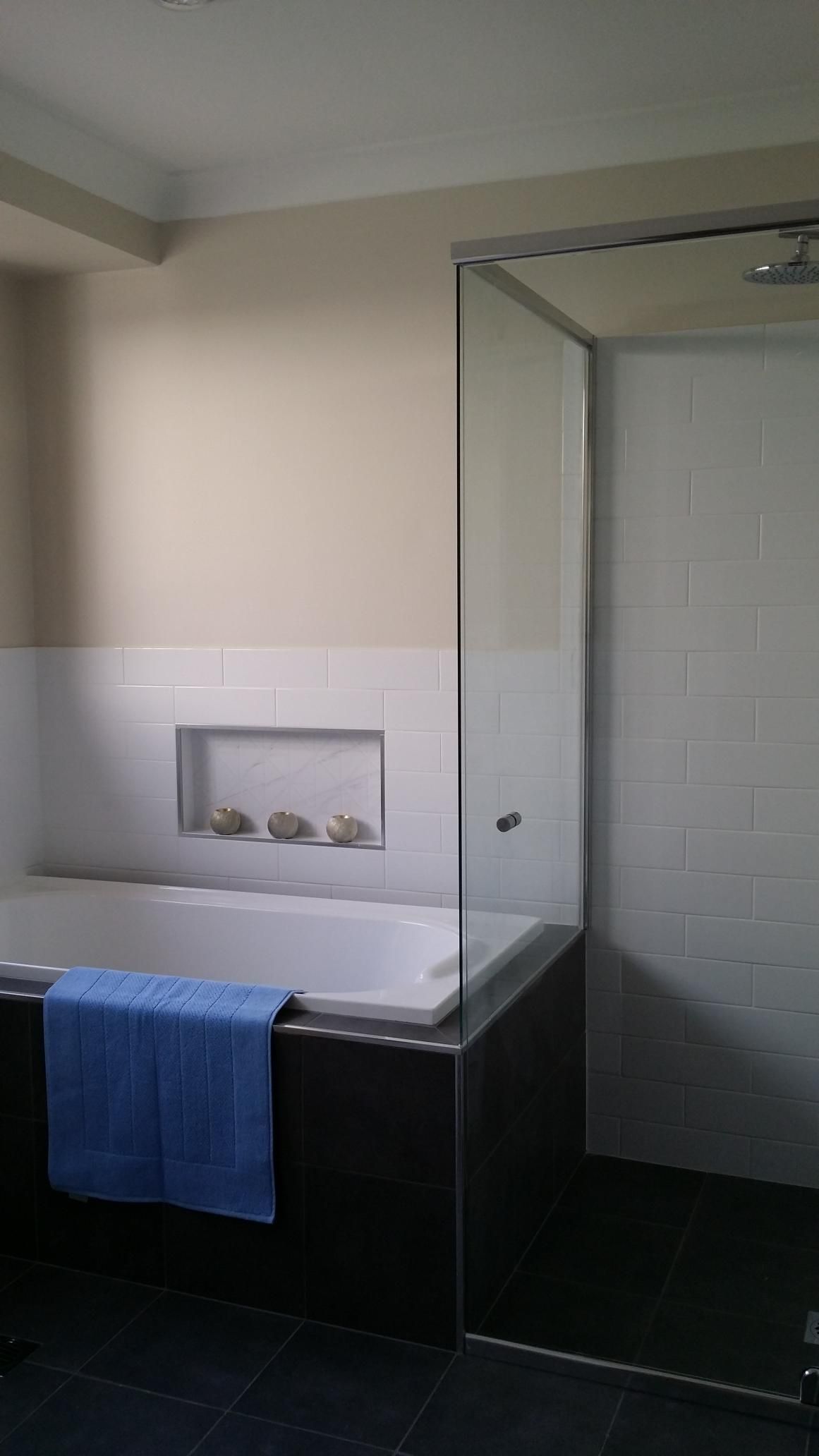 A Bathroom With a Bathtub and a Walk in Shower — Kareela Constructions In Tamworth, NSW