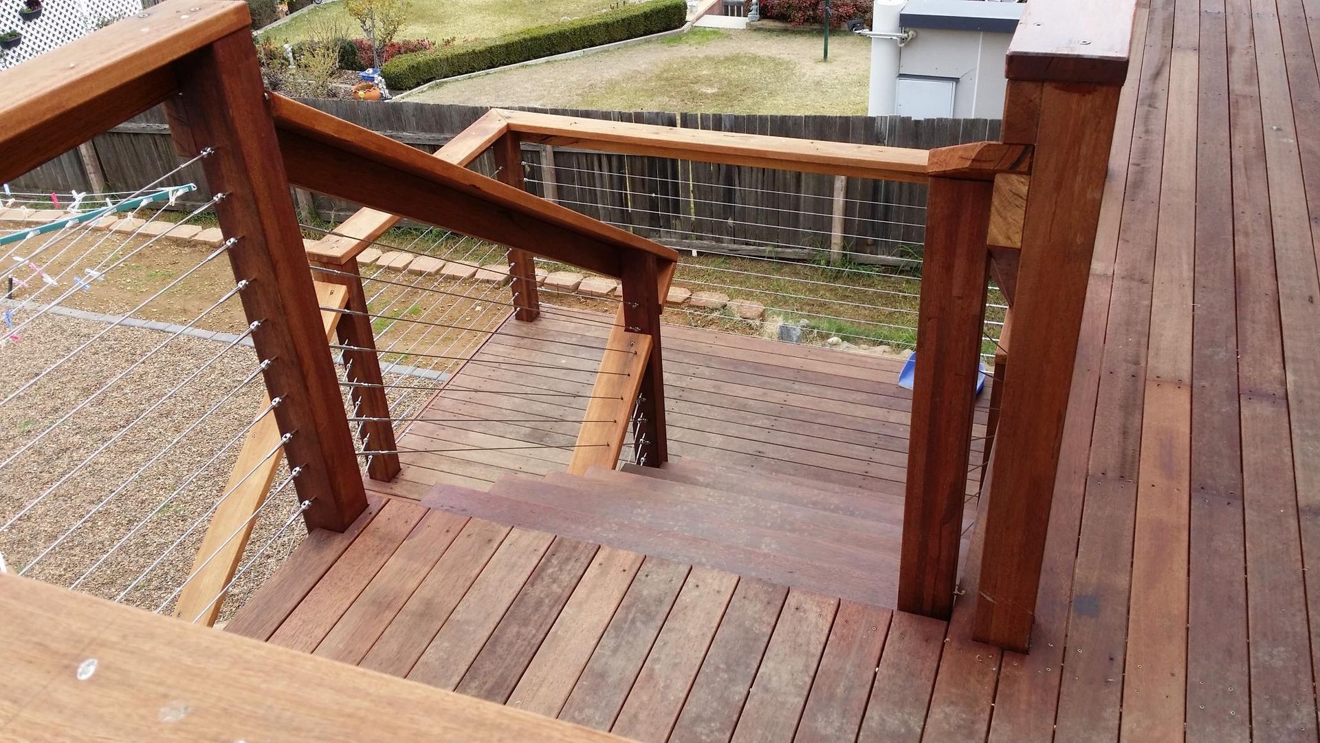 A Wooden Deck With Stairs Leading Up to It — Kareela Constructions In Tamworth, NSW