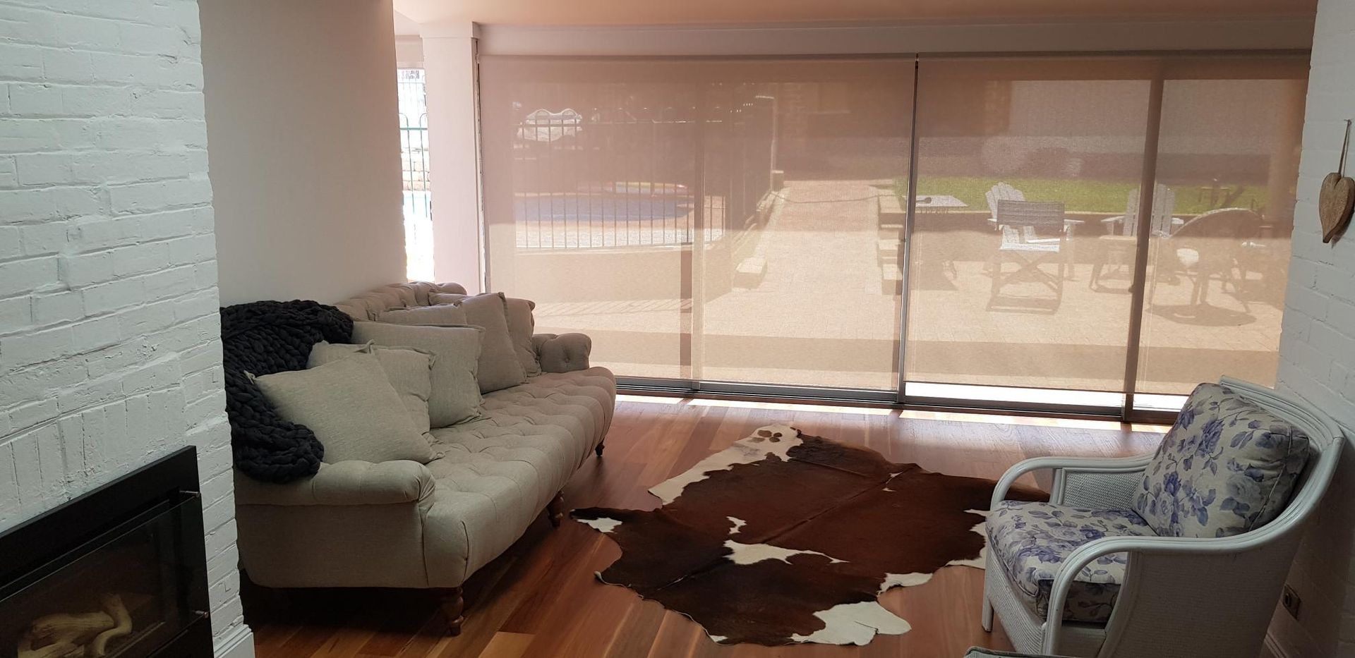 A Living Room With a Couch and Chair — Kareela Constructions In Tamworth, NSW