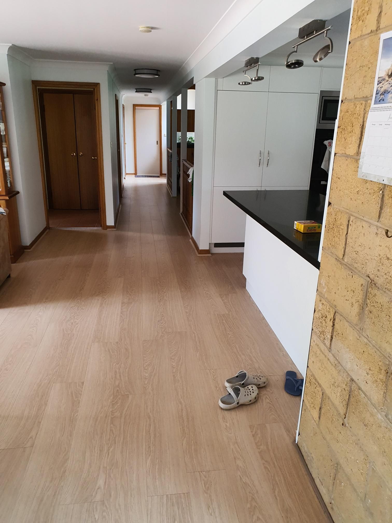 A Hallway in a House With a Pair of Shoes on the Floor — Kareela Constructions In Tamworth, NSW