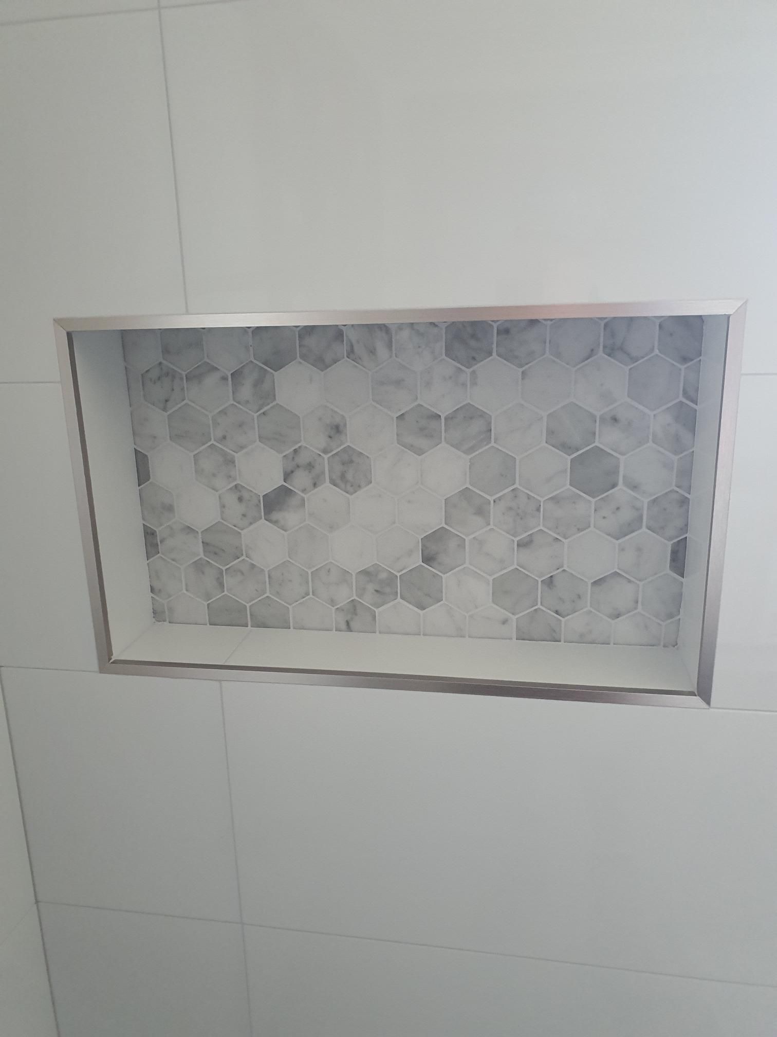 A Shower Niche With Marble Tiles in a Bathroom — Kareela Constructions In Tamworth, NSW