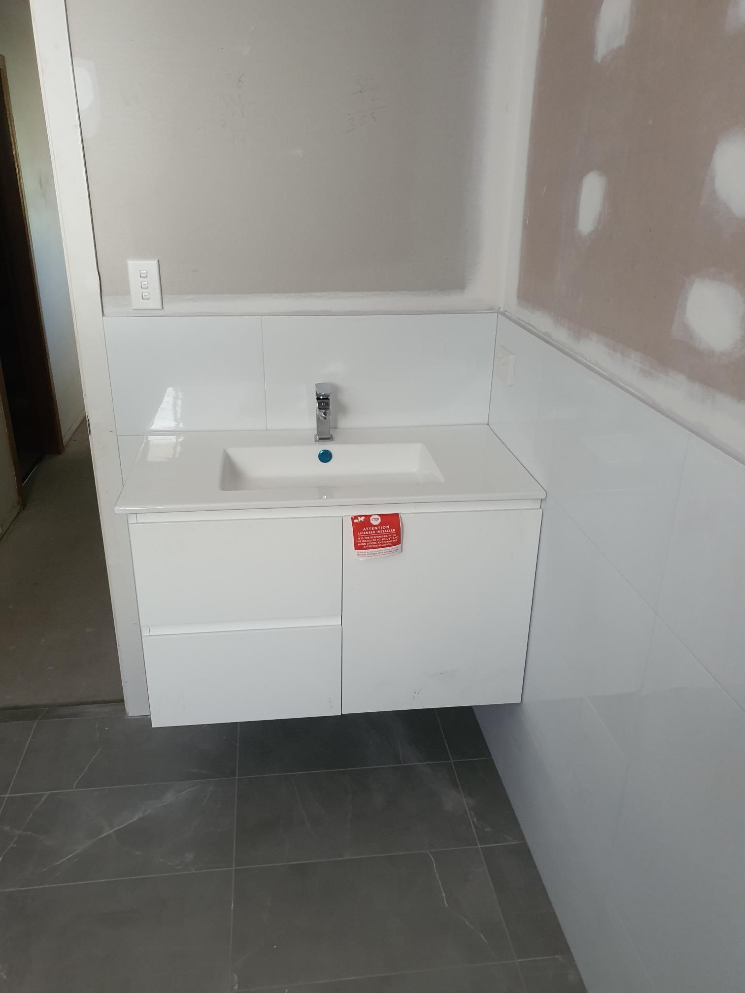 A Bathroom With a Sink and a Faucet in It — Kareela Constructions In Tamworth, NSW