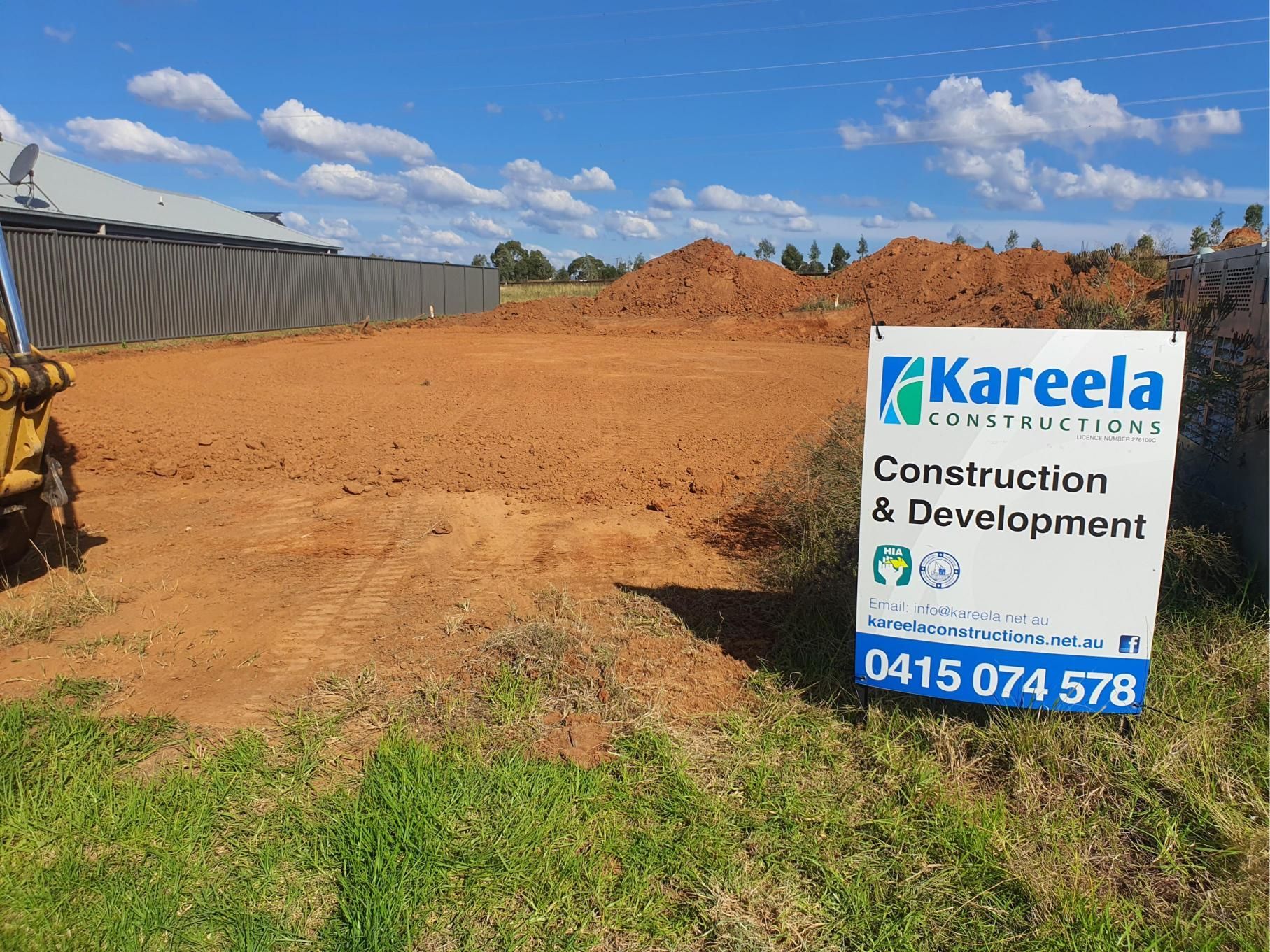 A Kitchen With White Cabinets — Kareela Constructions In Tamworth, NSW