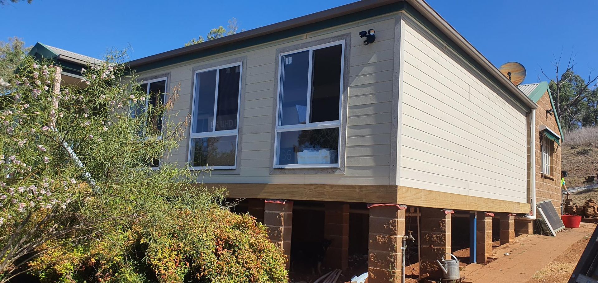 A House is Being Built on Stilts and Has a Lot of Windows — Kareela Constructions In Tamworth, NSW