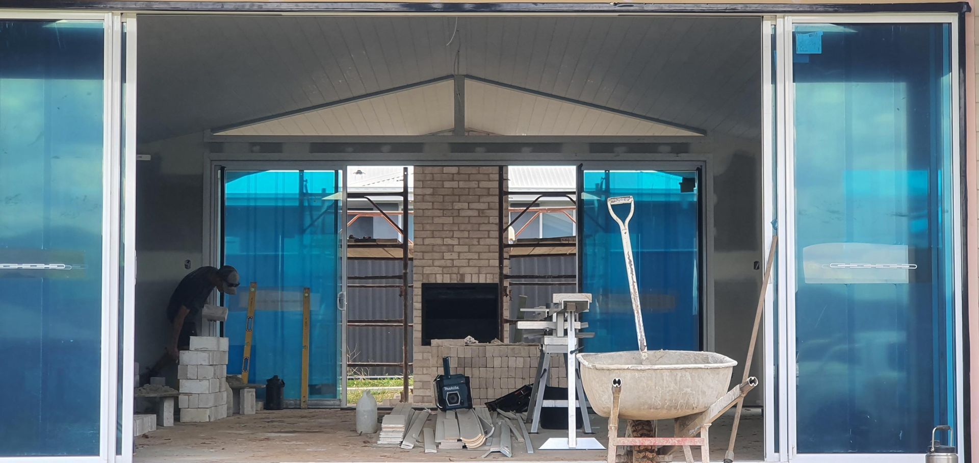 A House is Being Built With Sliding Glass Doors — Kareela Constructions In Tamworth, NSW