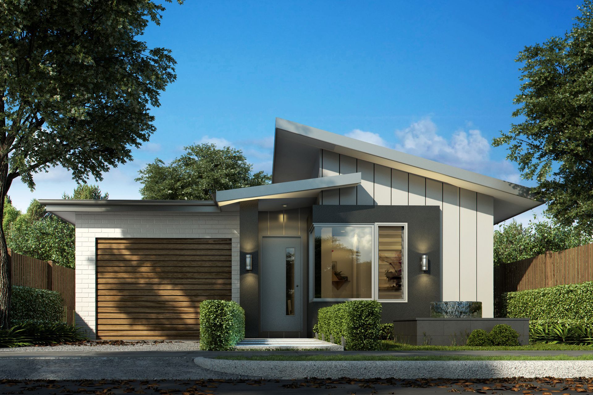 A Small House With a Garage and Trees — Kareela Constructions In Hillvue, NSW