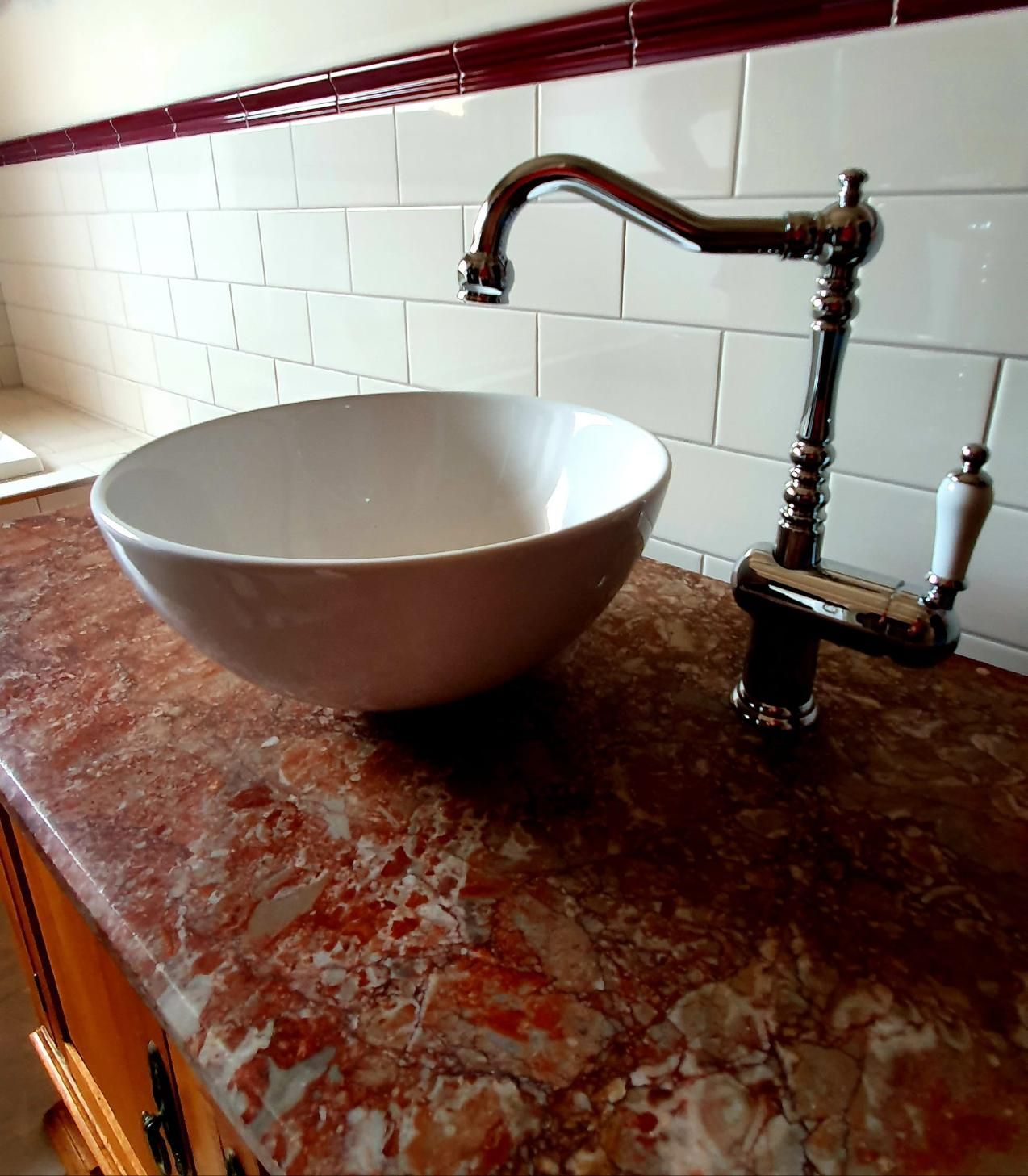 A Bathroom Sink With a Faucet on a Counter Top — Kareela Constructions In Tamworth, NSW