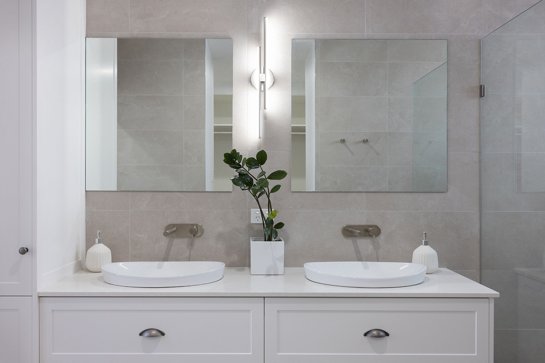 A Bathroom With a Bathtub and a Large Window — Kareela Constructions In Tamworth, NSW