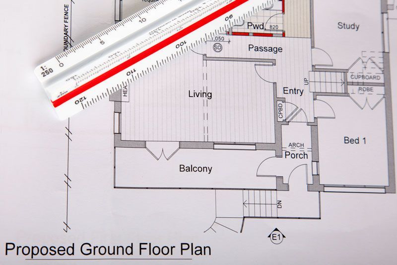 A Ruler is Laying on Top of a Proposed Ground Floor Plan — Kareela Constructions In Tamworth, NSW