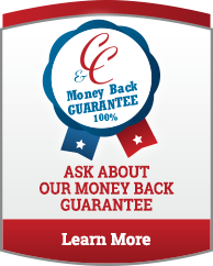 A sign that says ask about our money back guarantee