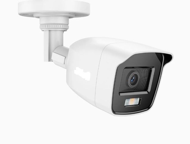 Commercial Electrical Contractor - A white arlo camera is hanging from the ceiling in a waiting room.