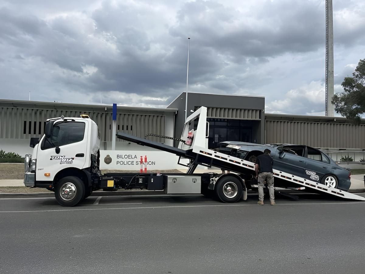 Tow Truck Loading a Car on a Road — Tow Biz in Park Avenue, QLD