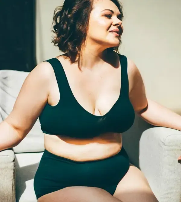 Women in underwear after successful tuberous breast surgery