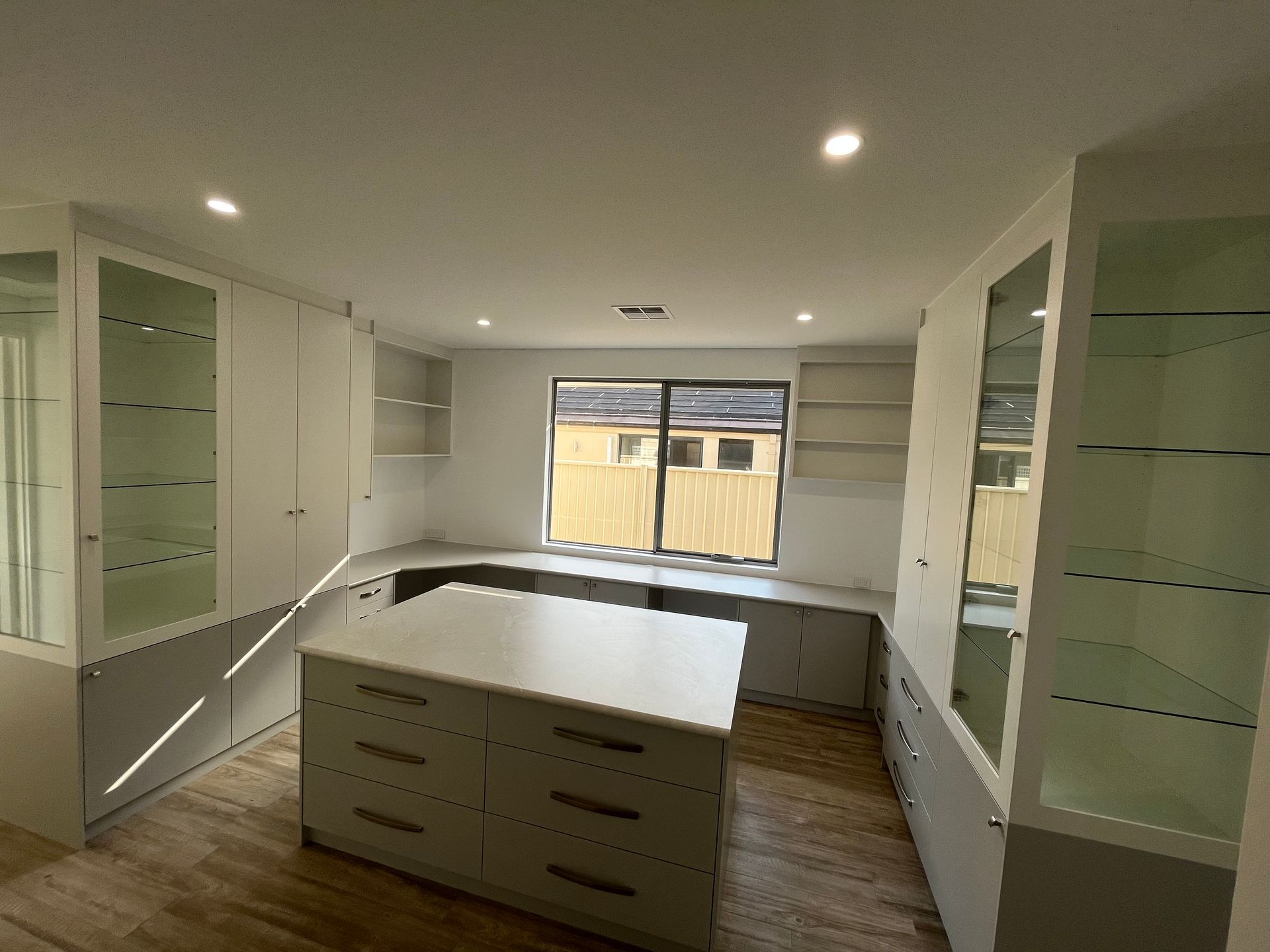 Built In Desk And Display Cupboard.