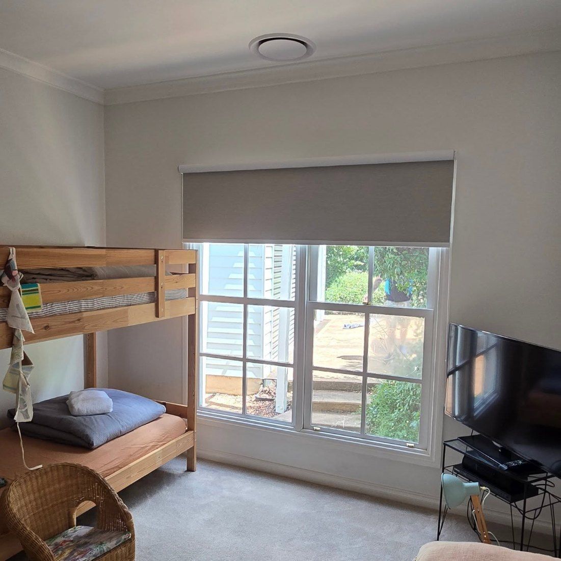 A Bedroom With a Bunk Bed, Window With a Shade — Glenn Koek - Shutters - Curtains - Blinds in Shellharbour, NSW
